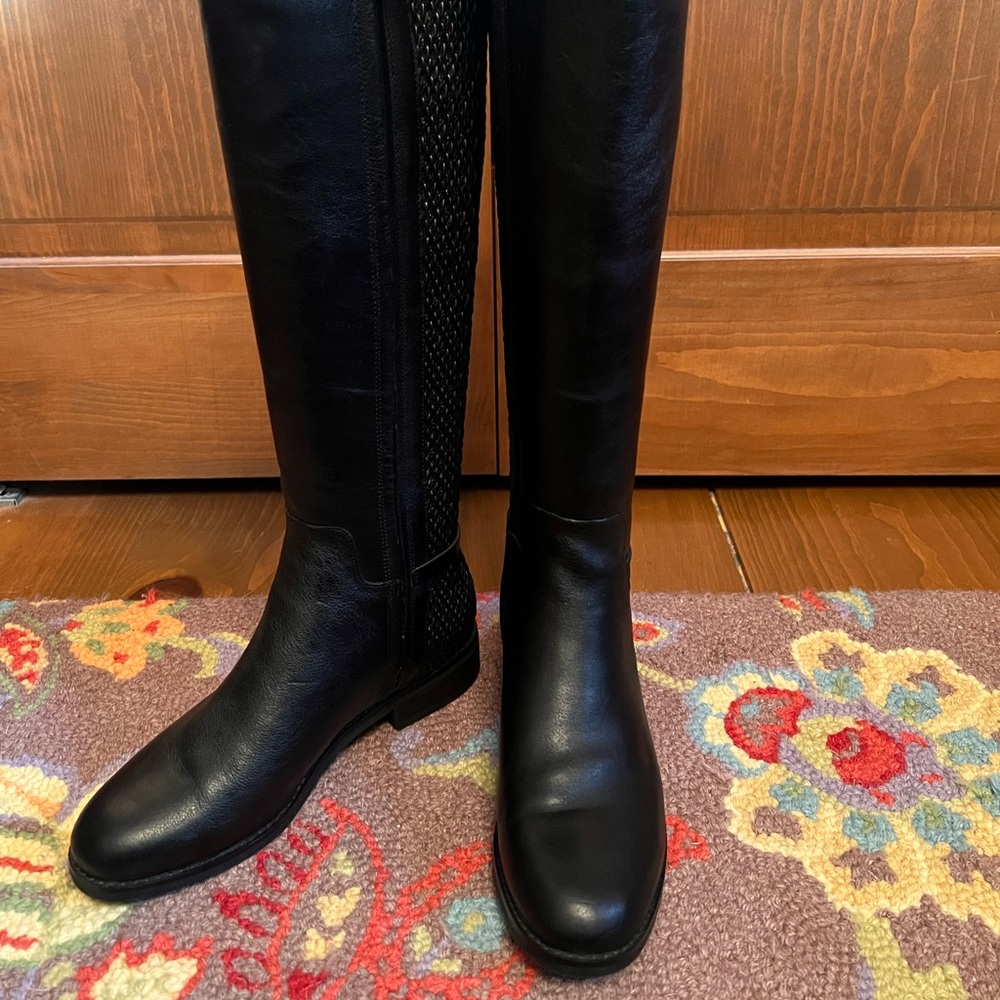 NWOT Cole Haan leather boot with stretchy calf. Man made lining. 6.5